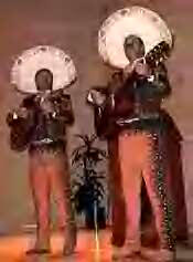 Mariachis play the vihuela and the guitar.
