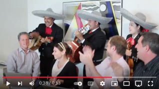 image of surprise birthday Mariachi at office